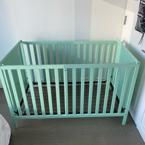 Sturdy teal baby crib